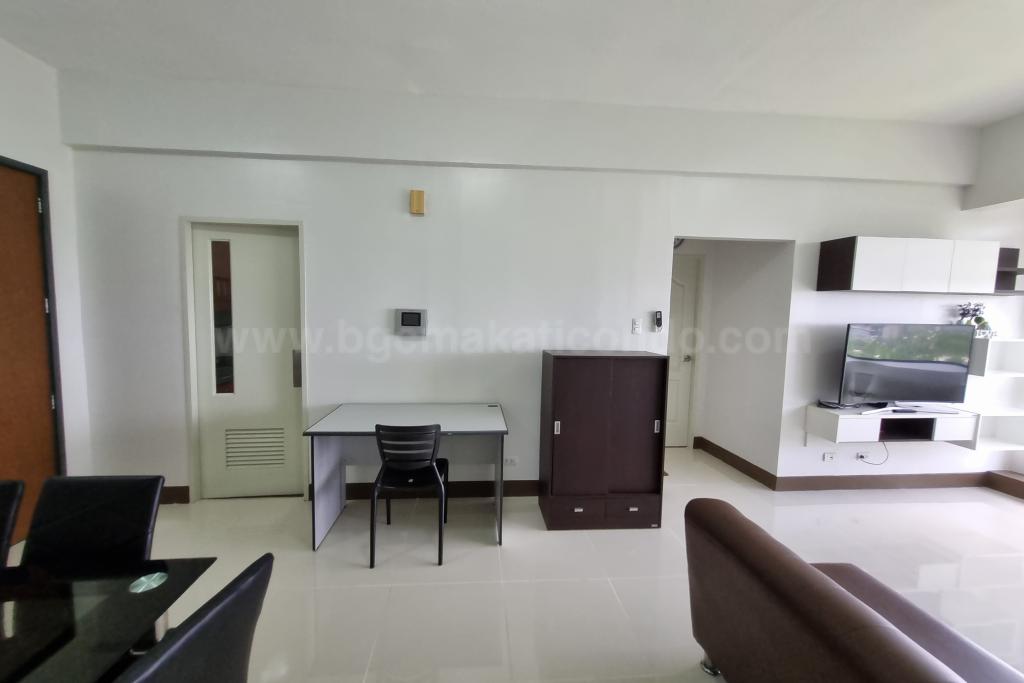 Living area adjoining dining room of two bedroom condominium unit at Bellagio tower 3