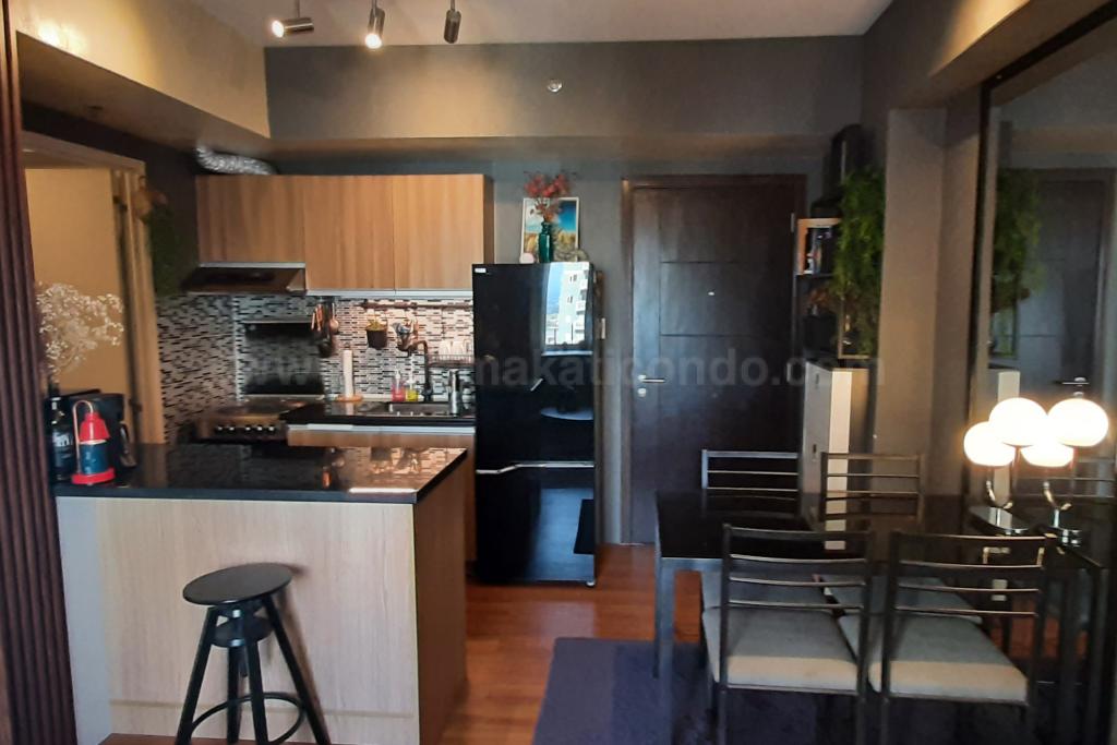 Kitchen and dining areas of 1-bedroom condo unit at Avida Towers One Union Place