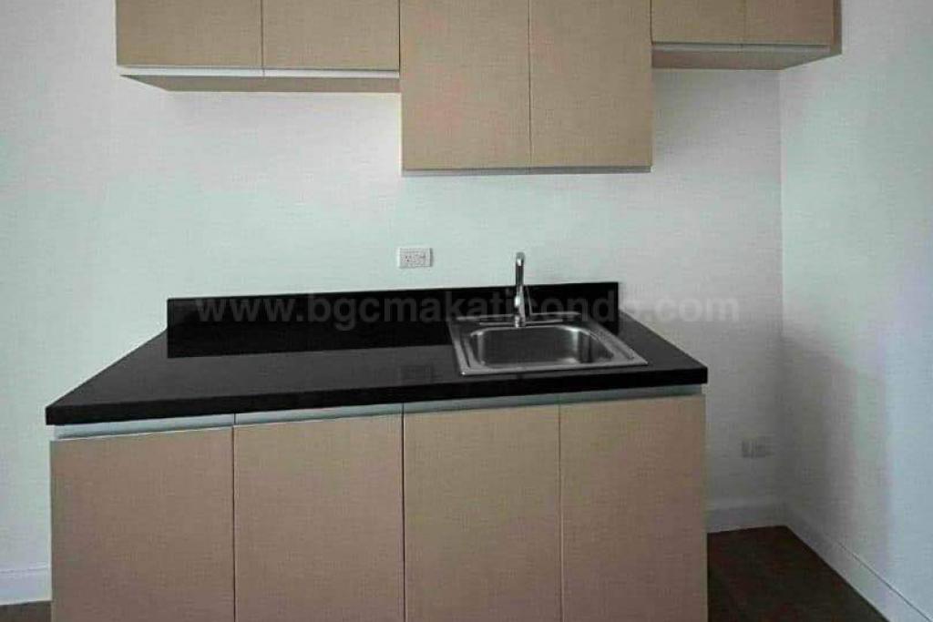 Cabinets of kitchen area of studio condominium unit at The Veranda