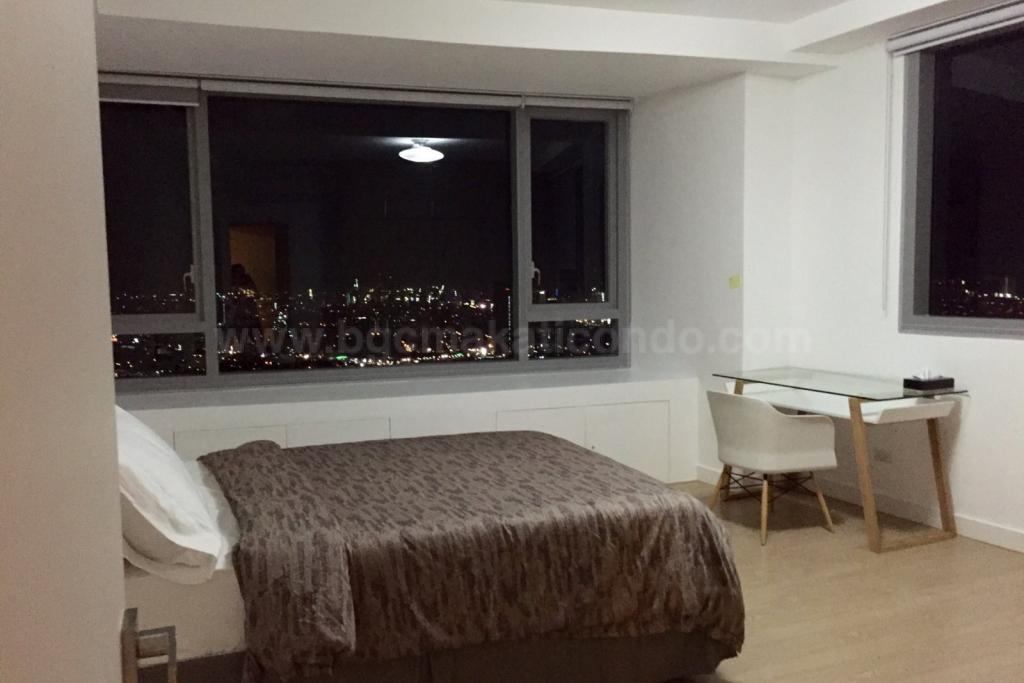 Bedroom of 1-bedroom condo unit at One Shangri-La Place, Shang Central