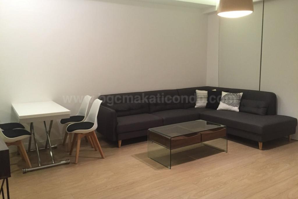 Dining and living areas of 1-bedroom condo unit at One Shangri-La Place, Shang Central