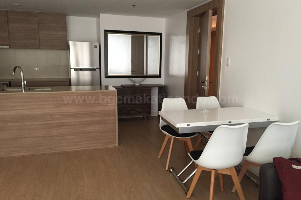 Kitchen and dining areas of 1-bedroom condo unit at One Shangri-La Place, Shang Central