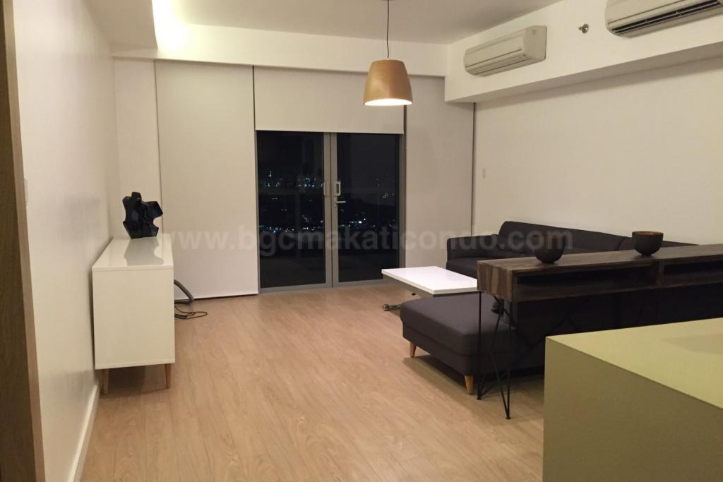 Living area of 1-bedroom condo unit at One Shangri-La Place, Shang Central