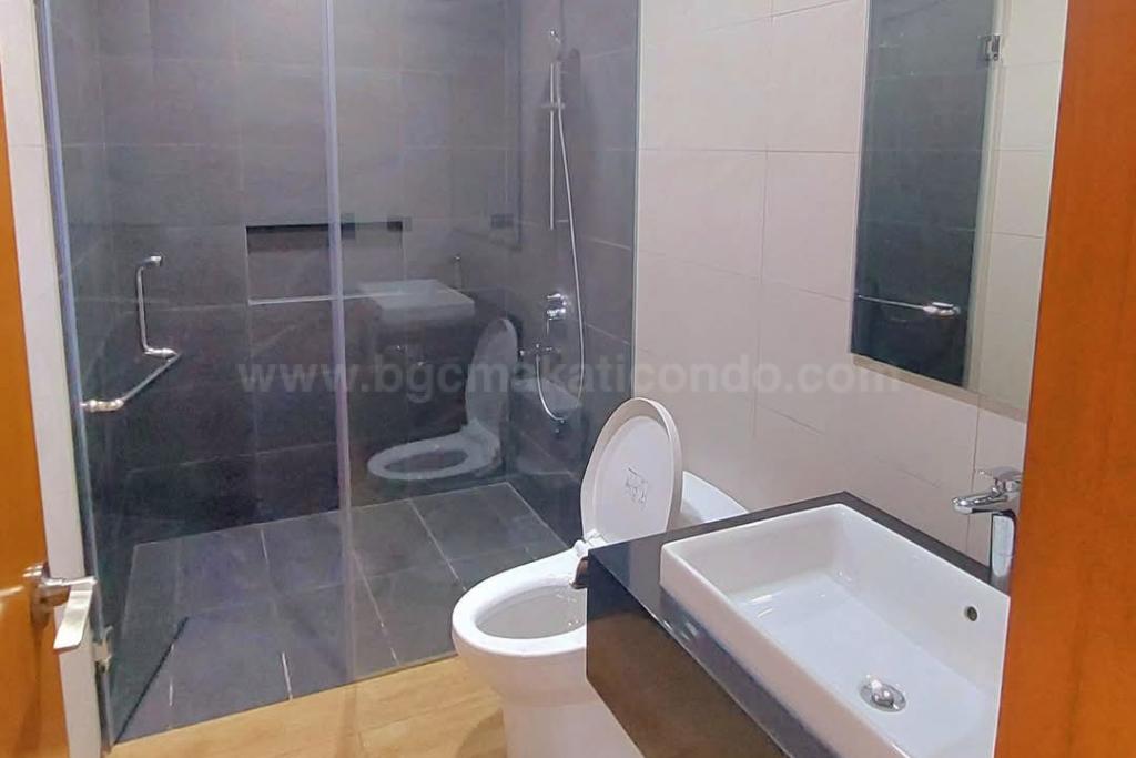 Toilet and bath 2 of 2-bedroom condo unit at The Seasons Residences