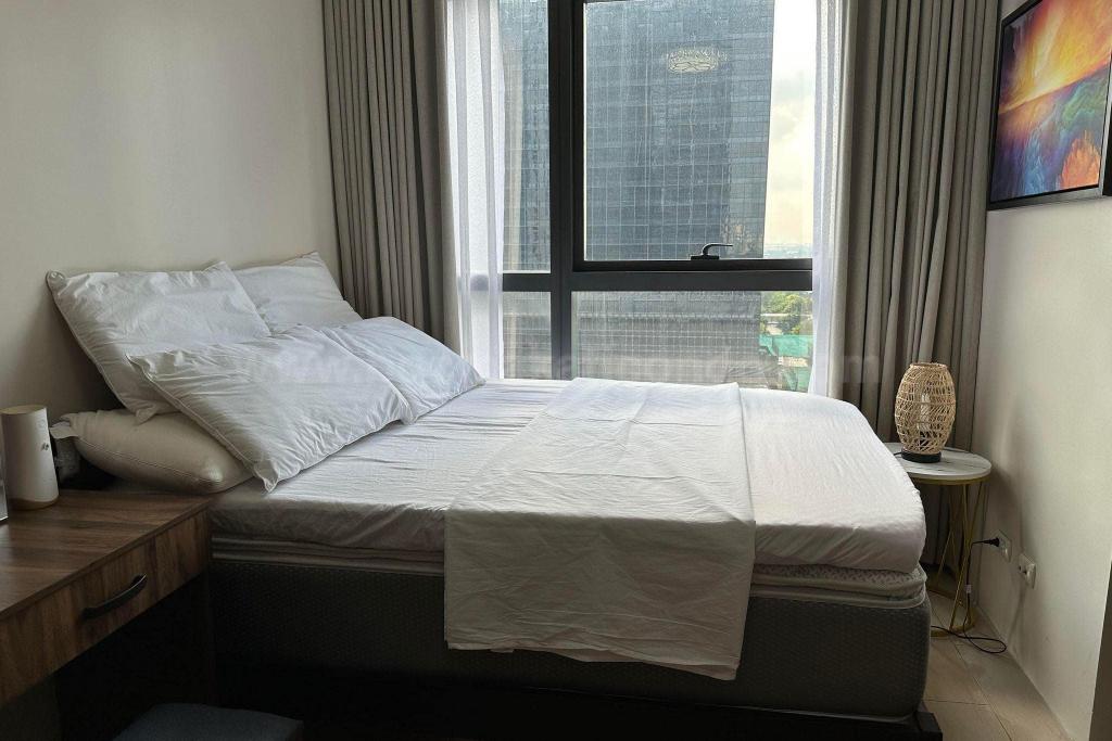 Bedroom 2 of 2-bedroom condo unit at Uptown Ritz