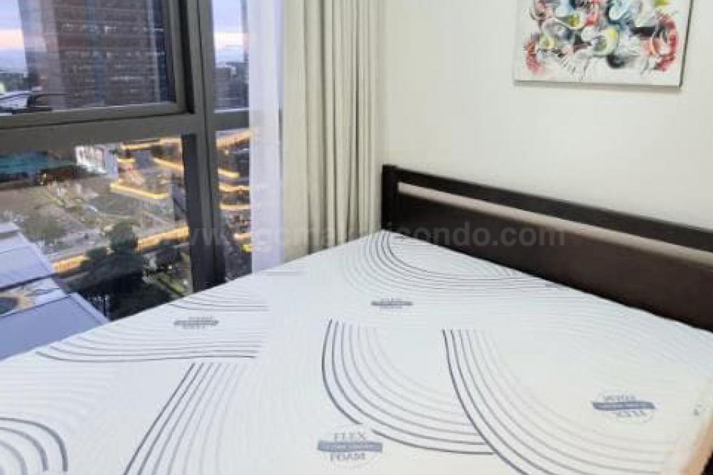 Bedroom of 2-bedroom condo unit at Uptown Ritz