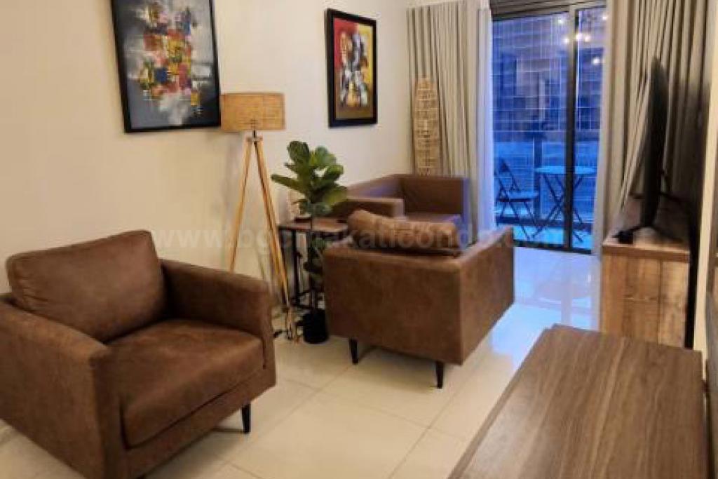 Living area of 2-bedroom condo unit at Uptown Ritz Residences