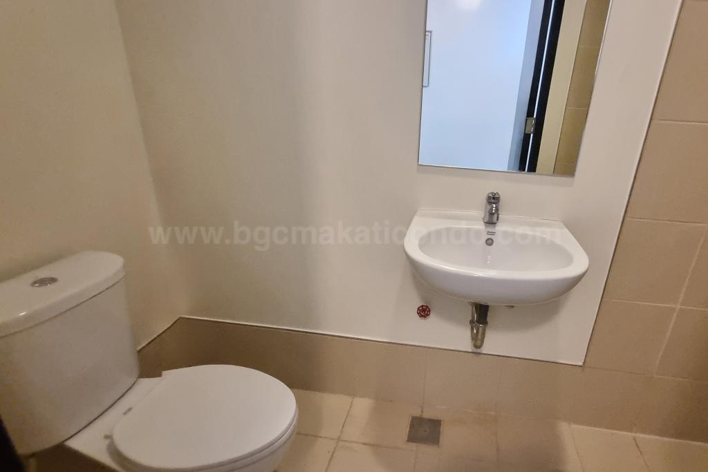 Utility toilet and bath of 2-bedroom condo unit at West Gallery Place