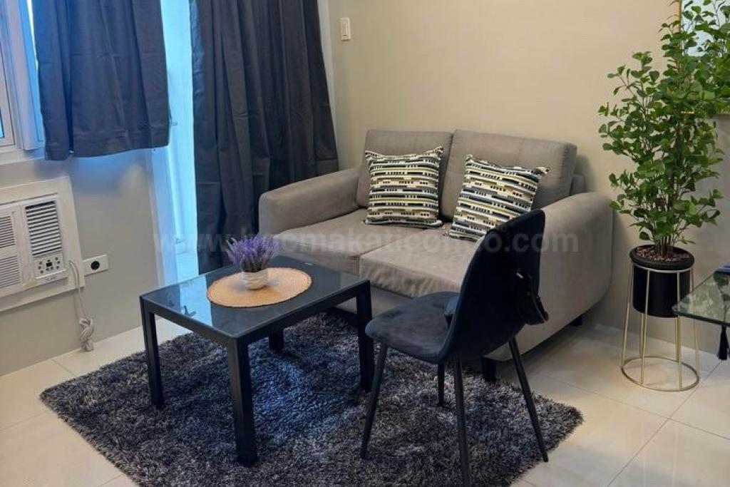 Living area of 1-bedroom condo unit at Times Square West