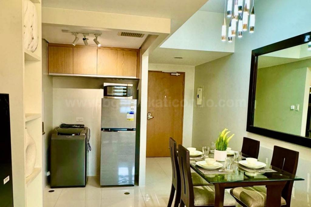 Dining and kitchen areas of 2-bedroom condo unit at Times Square West