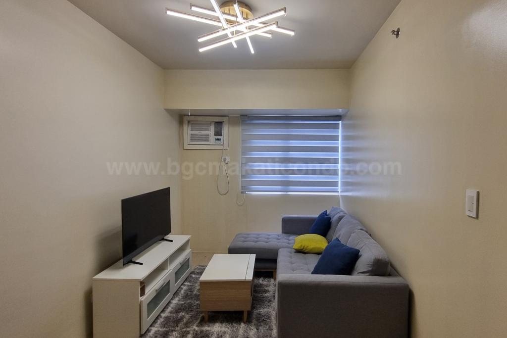 Living area whole view of 1-bedroom condo unit at Avida Towers Turf tower 1