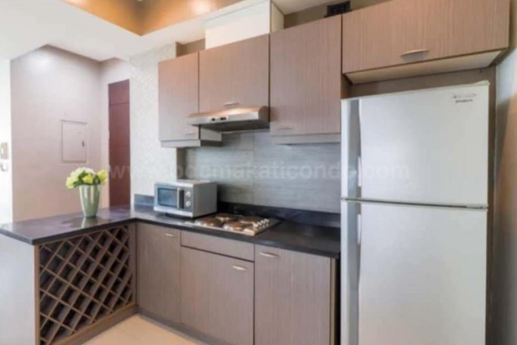 Kitchen area of 2-bedroom condo unit at Sapphire Residences