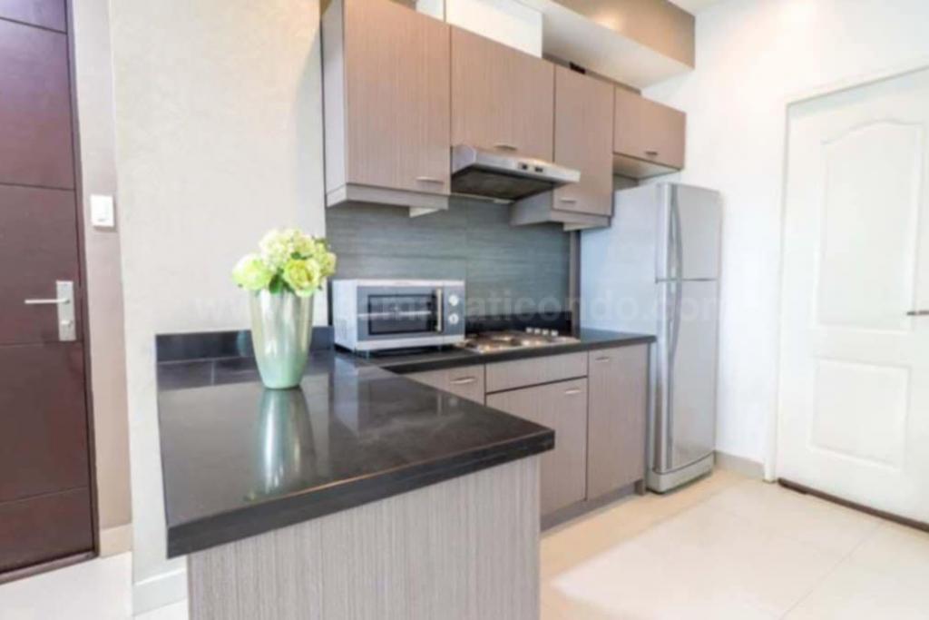 Kitchen area of 2-bedroom condo unit at Sapphire Residences
