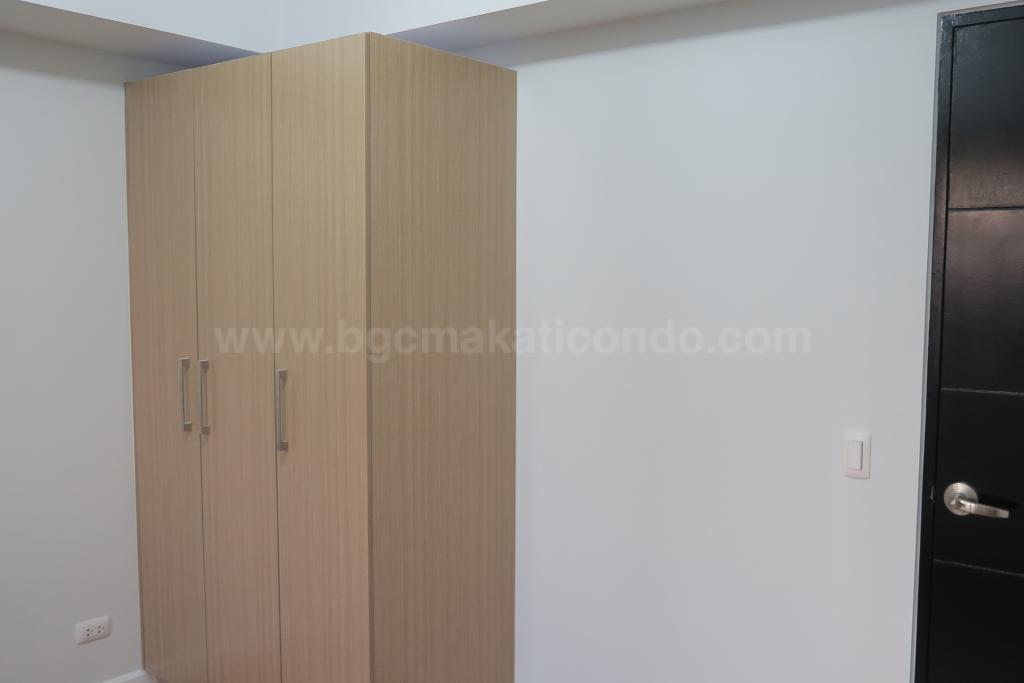 Bedroom 1 built-in wardrobes of 2-bedroom condo unit at Two Maridien