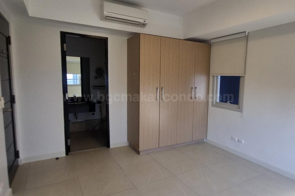 Master's bedroom built-in wardrobes of 2-bedroom condo unit at Two Maridien