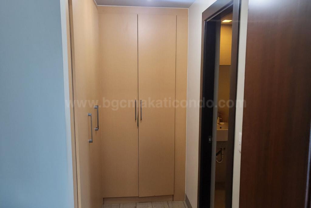 Master's built-in wardrobes of 3-bedroom condo unit at Uptown Parksuites tower 2