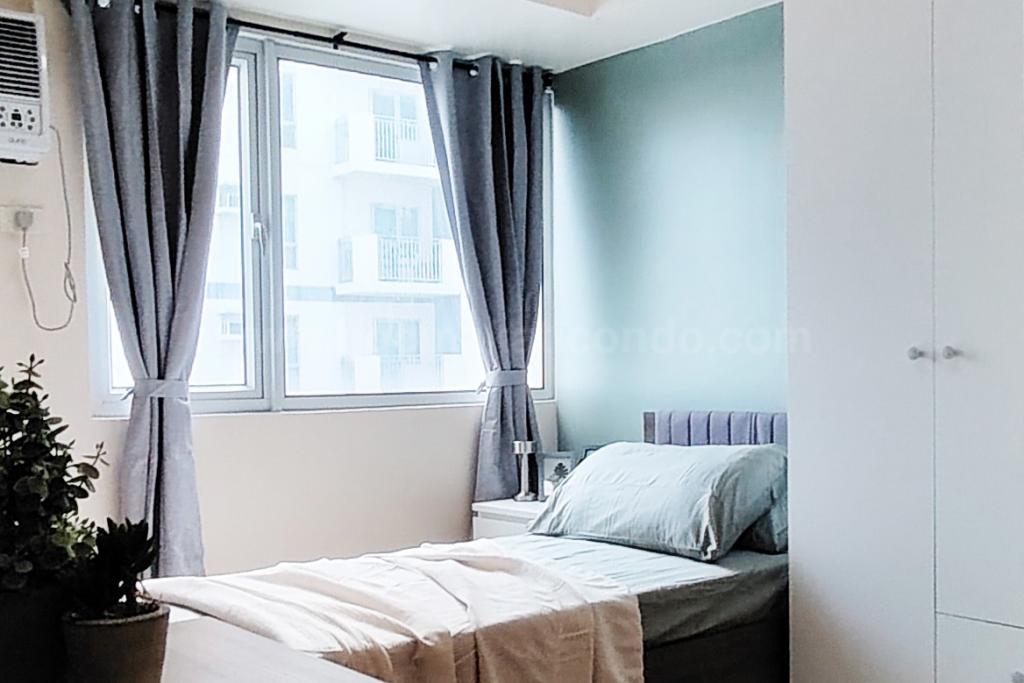 Sleeping area of studio condo unit at Avida Towers One Union Place tower 1