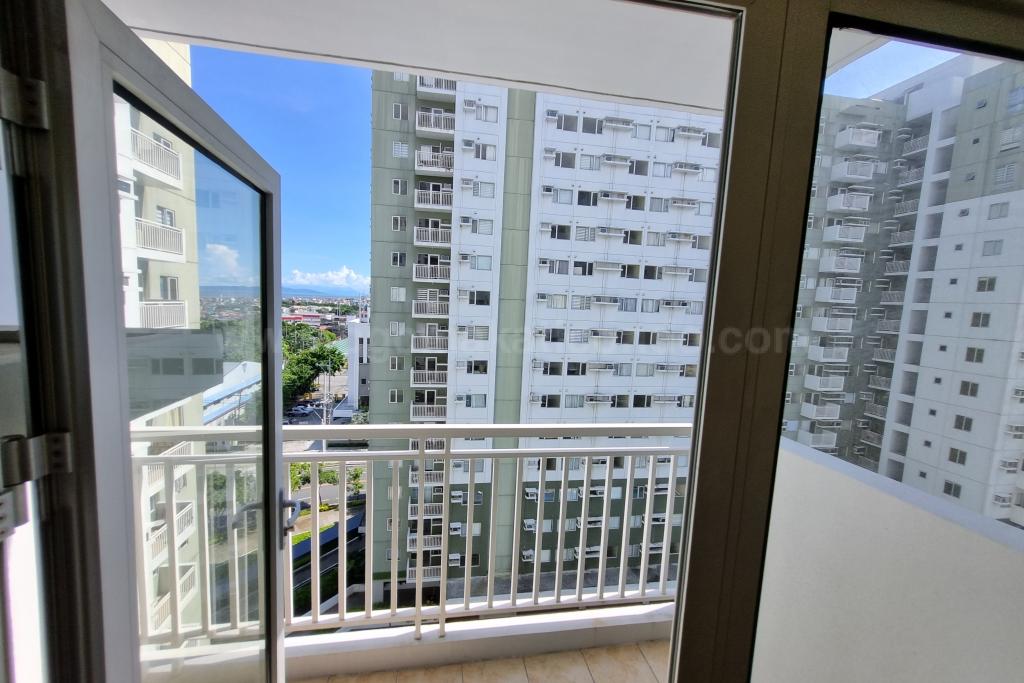 Balcony view from inside of 1 bedroom condominium unit at Avida Towers One Union Place tower 3