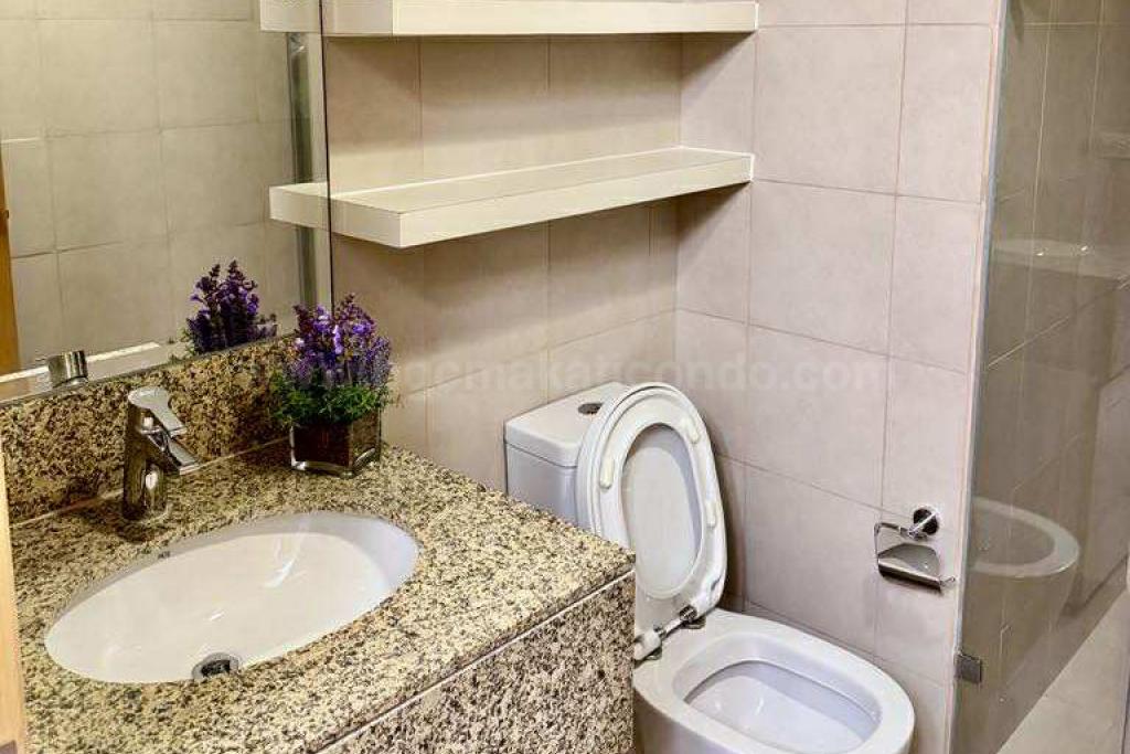 Toillet and bathj of 1-bedroom condo unit at Times Square West