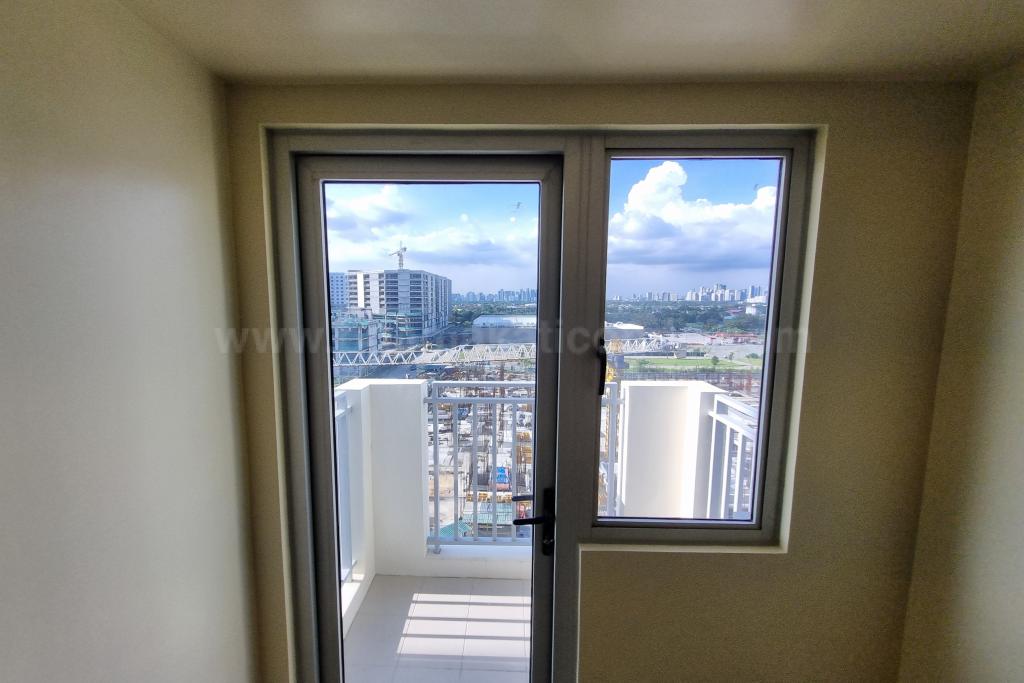 View of the balcony through the glass door and window of 1 bedroom condominium unit at Avida Towers Vireo tower 1 View of the balcony through the glass door and window of 1 bedroom condominium unit at Avida Towers Vireo tower 1