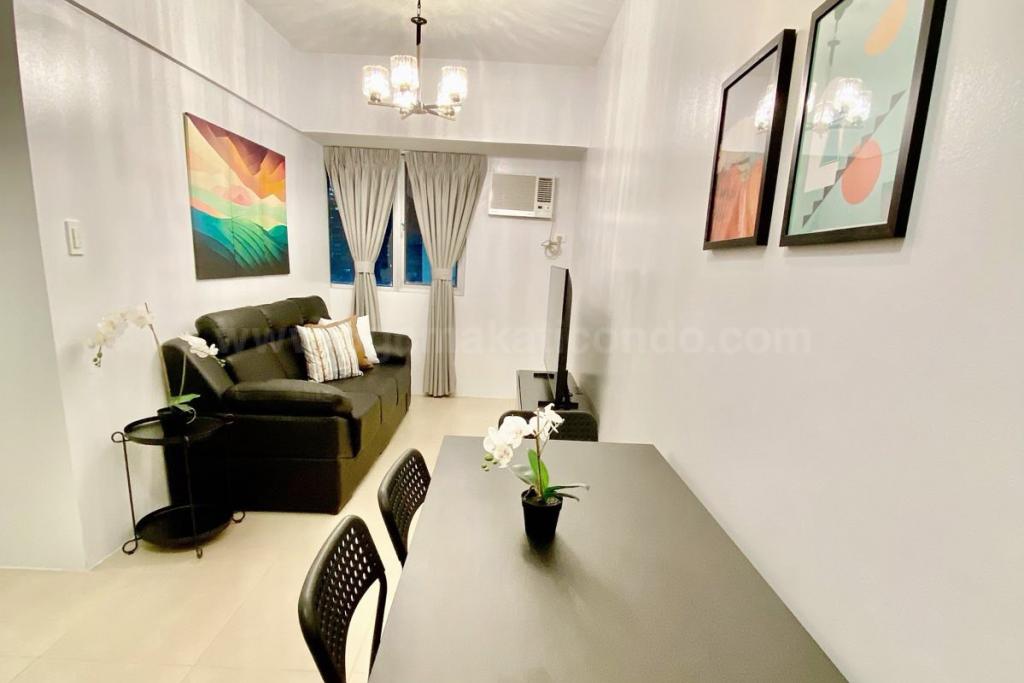 Dining and living areas of 3-bedroom condo unit at Avida Towers Turf tower 1