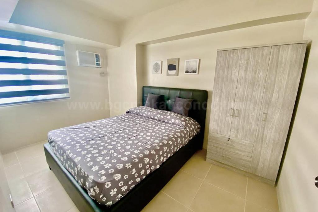 Bedroom of 1-bedroom condo unit at Avida Towers Turf tower 2