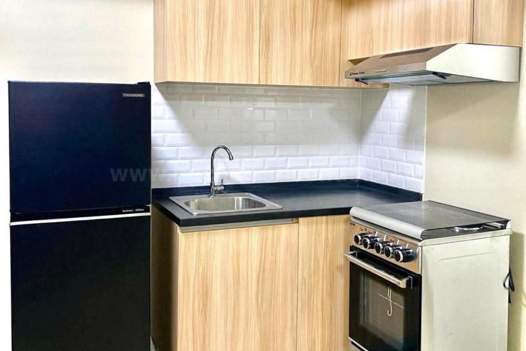 Kitchen area of 1-bedroom condo unit at Avida Towers Turf tower 2