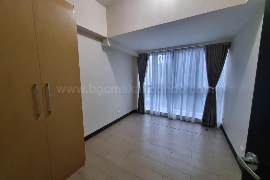 Bedroom 2 of 2-bedroom condo unit at Uptown Parksuites tower 1