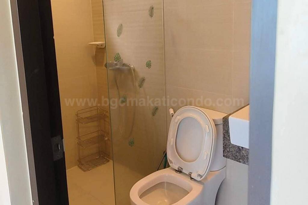 Common toilet and bath of 2-bedroom condo unit at Uptown Ritz Residences