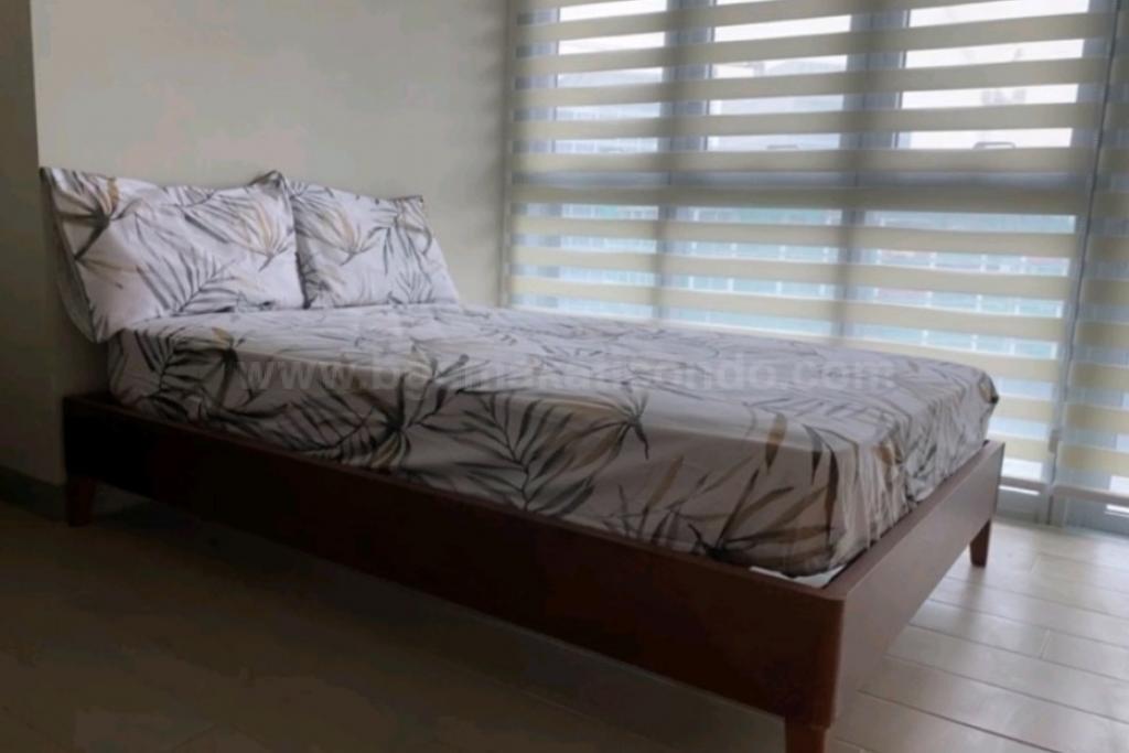 Bedroom of 1-bedroom condo unit at Uptown Parksuites tower 2