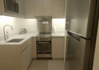 Kitchen of 2-bedroom condominium unit at Shang Salcedo Place
