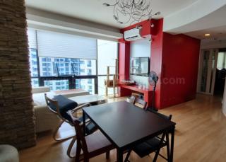 Dining and living areas of 2-bedroom condo unit at Bonifacio Ridge