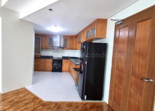 Kitchen area of 2-bedroom condo unit at Bonifacio Ridge