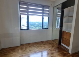 Bedroom 2 of 2-bedroom condo unit at Bonifacio Ridge