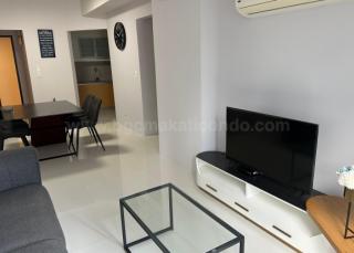 Living area of 2-bedroom condo unit at Uptown Ritz Residence