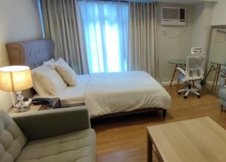 Sleeping area of studio condo unit at Verve Residences