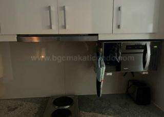 Kitchen area of executive 1-bedroom condo unit at Uptown Parksuites tower 1