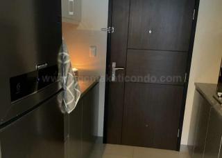 Kitchen area of executive 1-bedroom condo unit at Uptown Parksuites tower 1