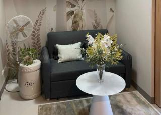 Living area of executive 1-bedroom condo unit at Uptown Parksuites tower 1