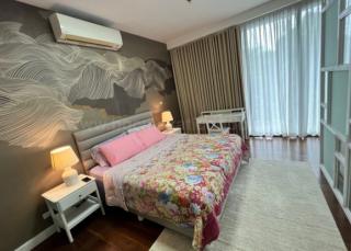 Bedroom of 1-bedroom loft type condo unit at Arbor Lanes Willow