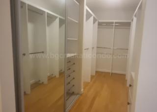 Master's bedroom walk-in closet of 4-bedroom bi-level penthouse unit at Pacific Plaza Towers