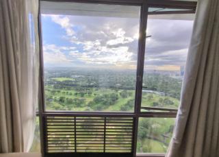 Floor-to-ceiling windows of master's bedroom of 2-bedroom condominium unit at Bellagio Tower 3