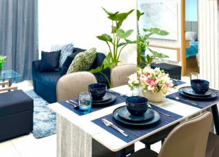 Dining and living areas of 1-bedroom condo unit at Times Square West