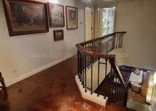 Stairs of 3-bedroom bi-level condo unit at The Regency at Salcedo