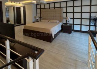 Master's bedroom of 2-bedroom loft unit at The Fort Residences