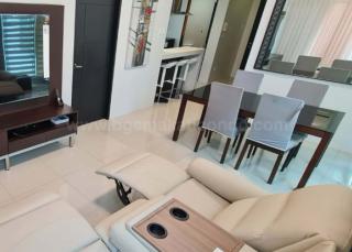 Living and dining areas of 2-bedroom condo unit at Crescent Park Residences