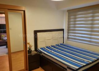 Bedroom of 1-bedroom condo unit at The Trion Towers tower 1