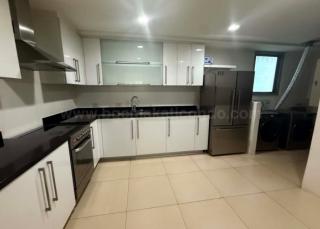 Kitchen area of 2-bedroom condo unit at One Serendra West Tower