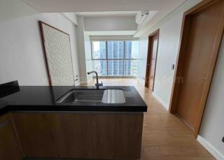 Kitchen and living areas of 1-bedroom condominium unit at The Seasons Residences