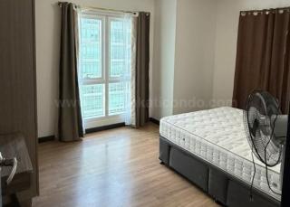 Bedroom 2 of 3-bedroom condo unit at Two Serendra Sequoia tower